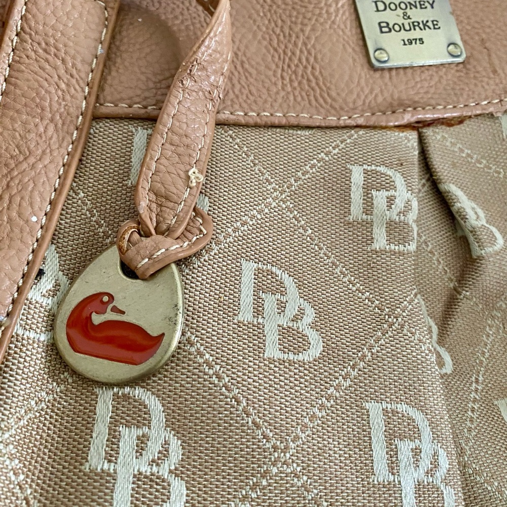Dooney & Bourke Y2K-ERA. handles are peeling along with other spots see photos. - Picture 2 of 16